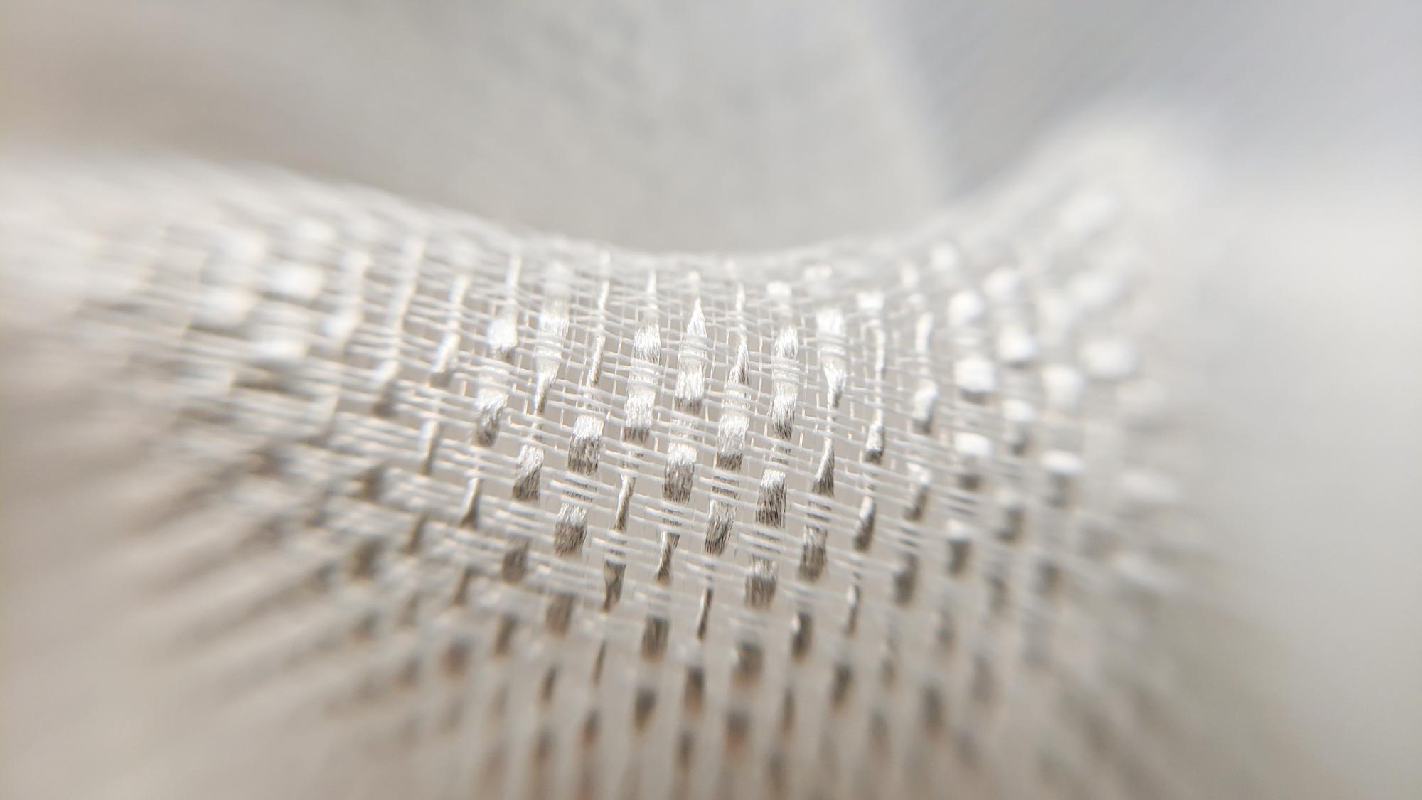 Detail: metallic thread and seed stitch