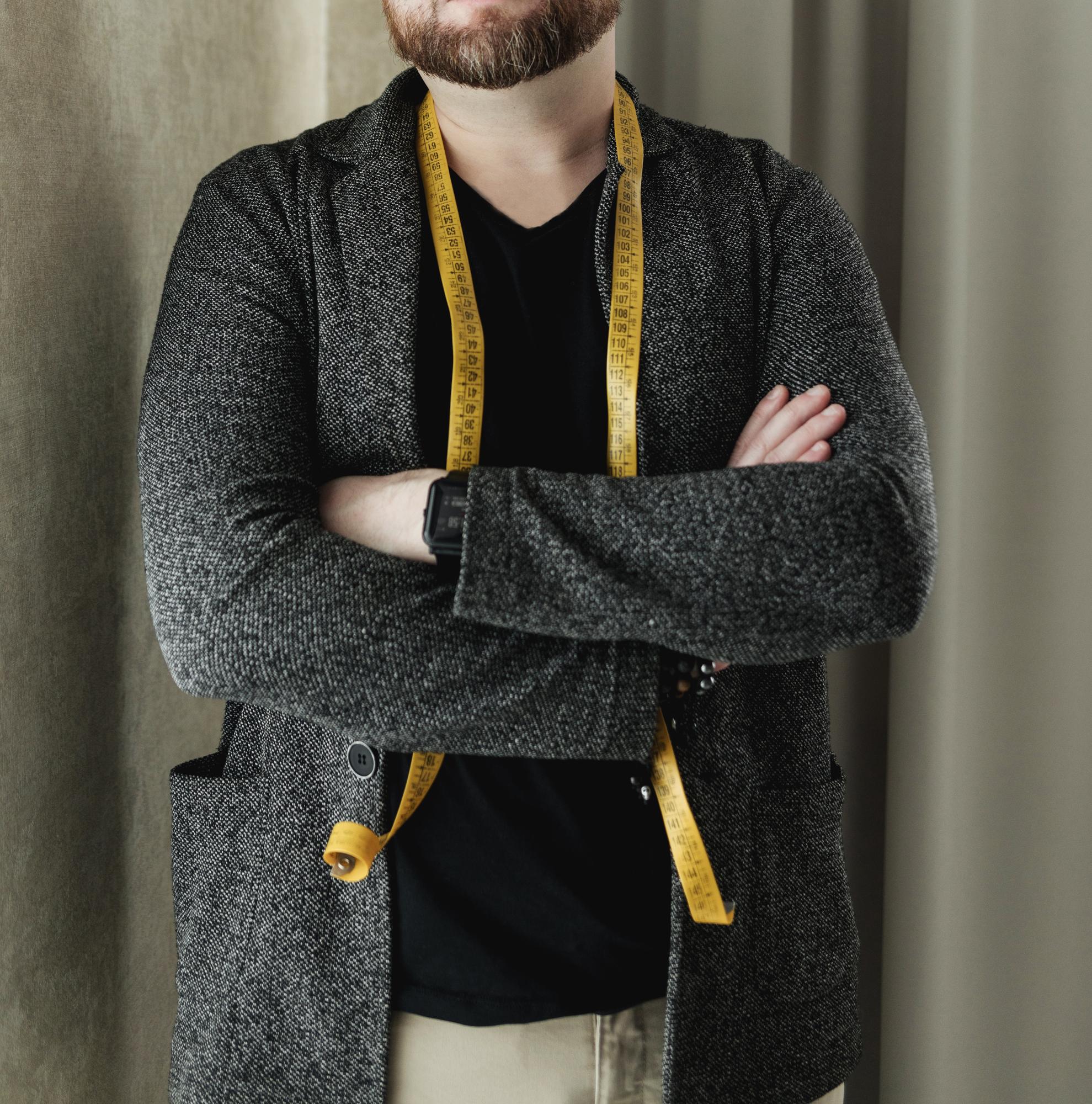 Tailored jacket with decorative embroidered sleeve